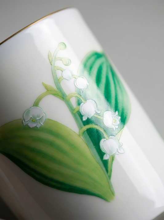 close up of Japanese koransha porcelain teacup with lily of the valley design