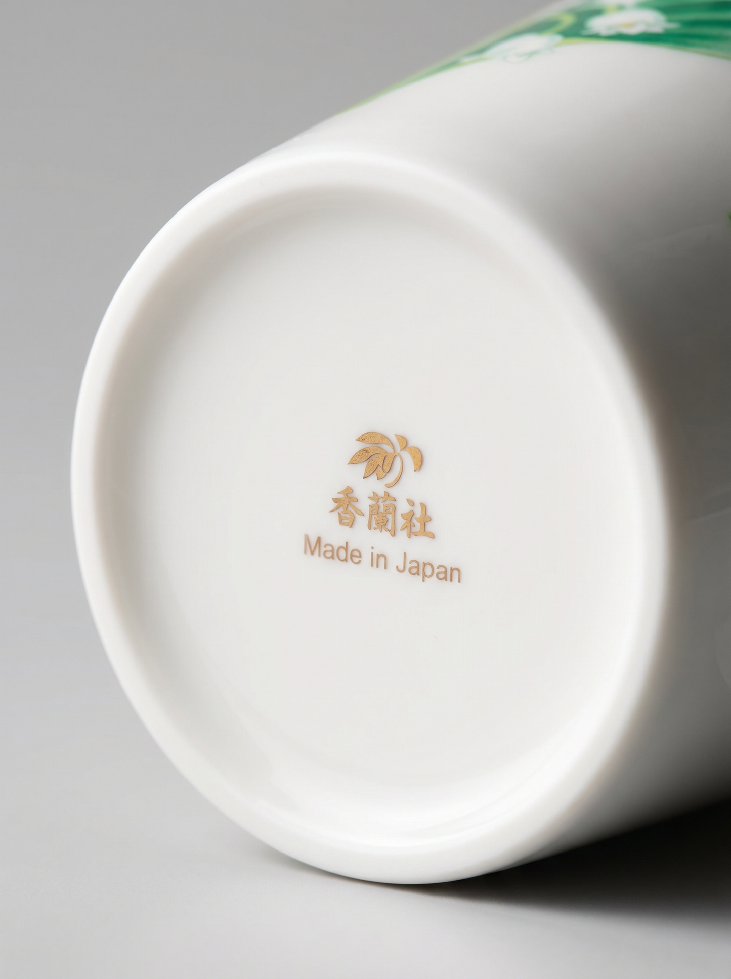 Ceramic product with 'Made in Japan' text on a gray background