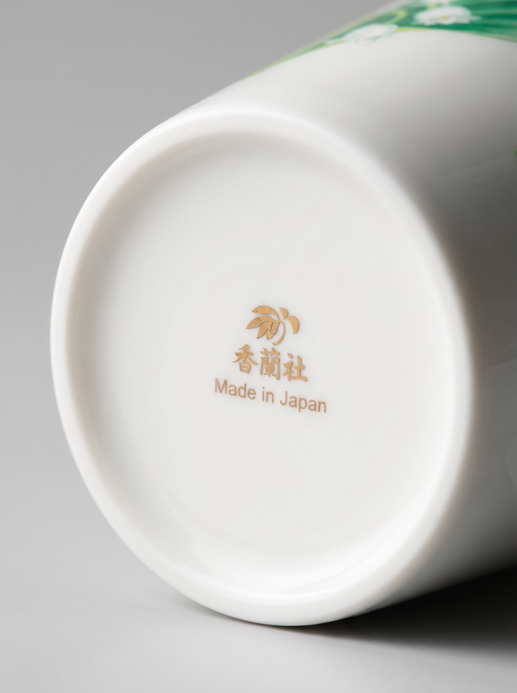 Ceramic product with 'Made in Japan' text on a gray background