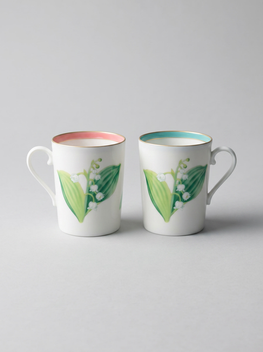 Japanese koransha porcelain set of 2 teacups with short handles and a lily of the valley design in turquoise and coral colors
