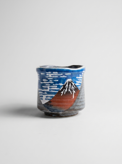 Japanese kutani ceramic cup with red fuji design for matcha, tea, latte, hojicha on a white background