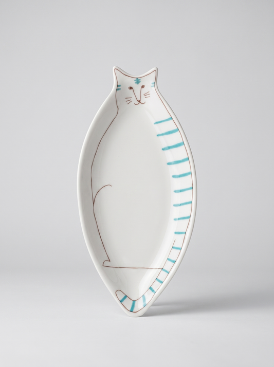Cat-shaped ceramic plate with blue stripes on a light gray background